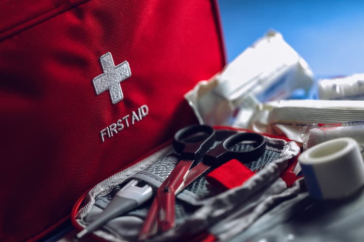 Close-up of essential first aid supplies, ready for use in emergency response and safety training scenarios.